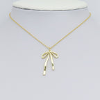 Slinky Gold Bow Shape Charm Pendant, Sku#LD665